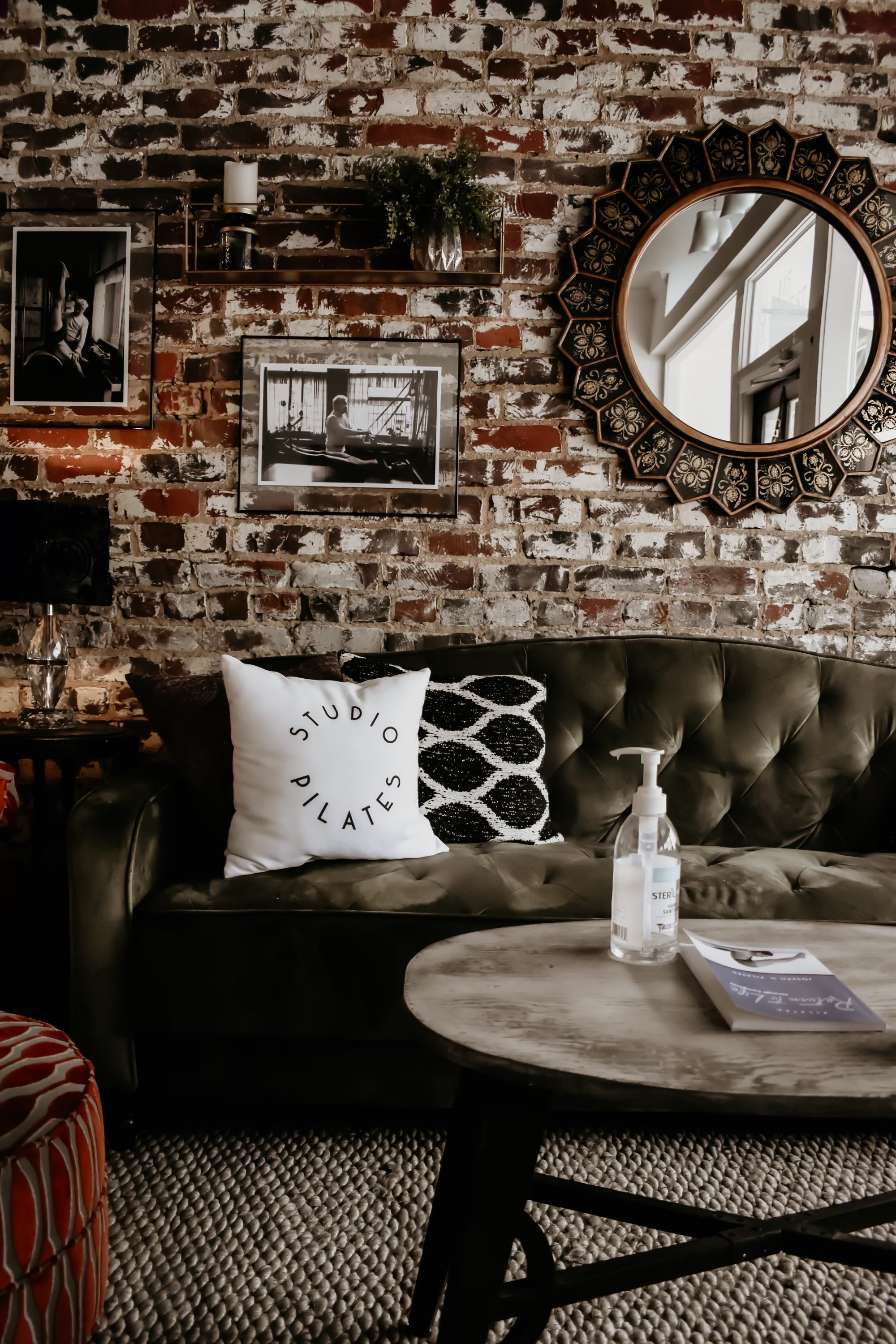 The studio’s vintage sofa and Studio Pilates pillow